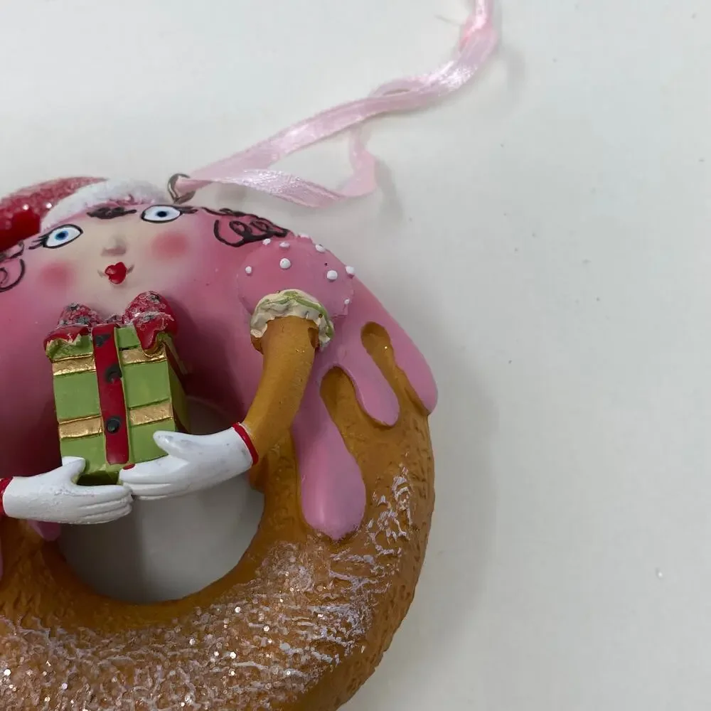 Ornament donut with face and legs